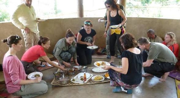 Sharing a traditional meal on a village homestay